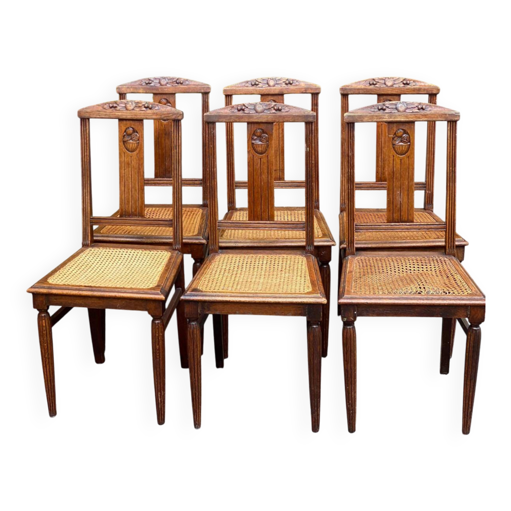 6 Art Deco dining chairs made of solid oak with caning from the 1950s.