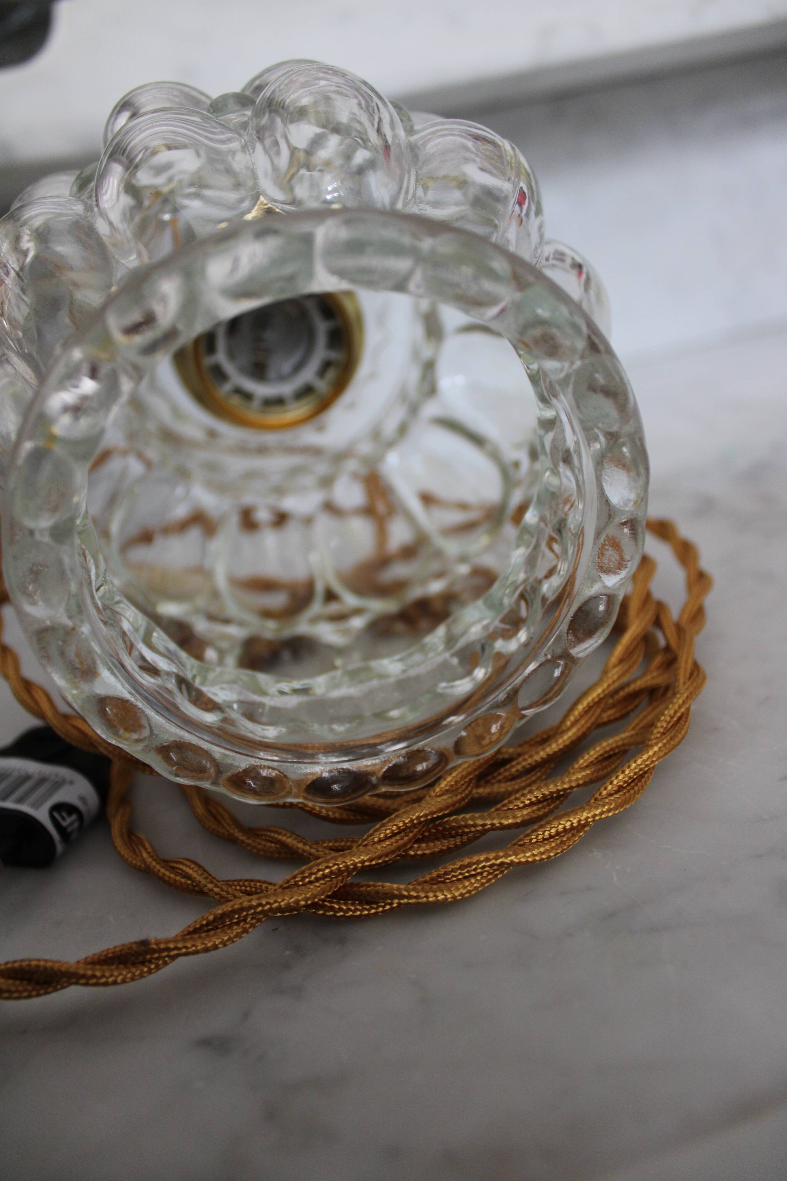 Moulded glass hand lamp