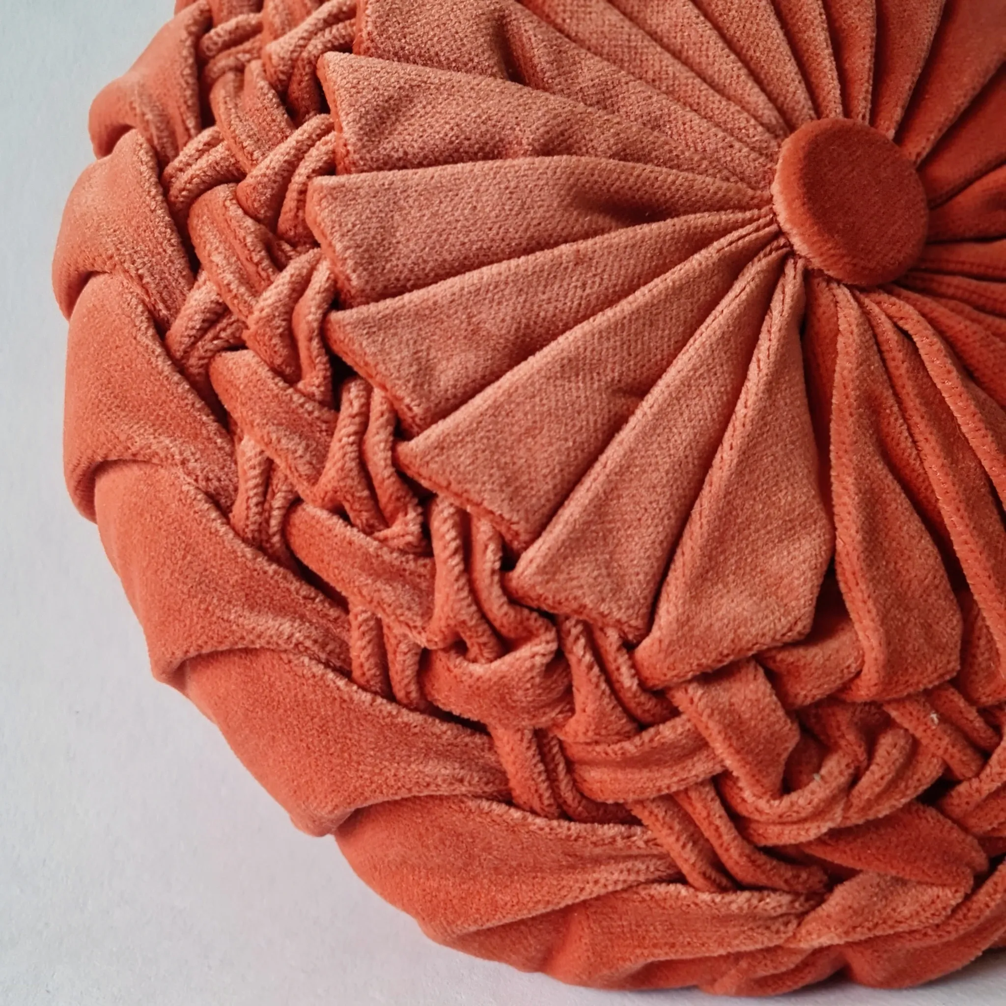 Pleated terracotta red velvet cushion