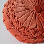 Pleated terracotta red velvet cushion