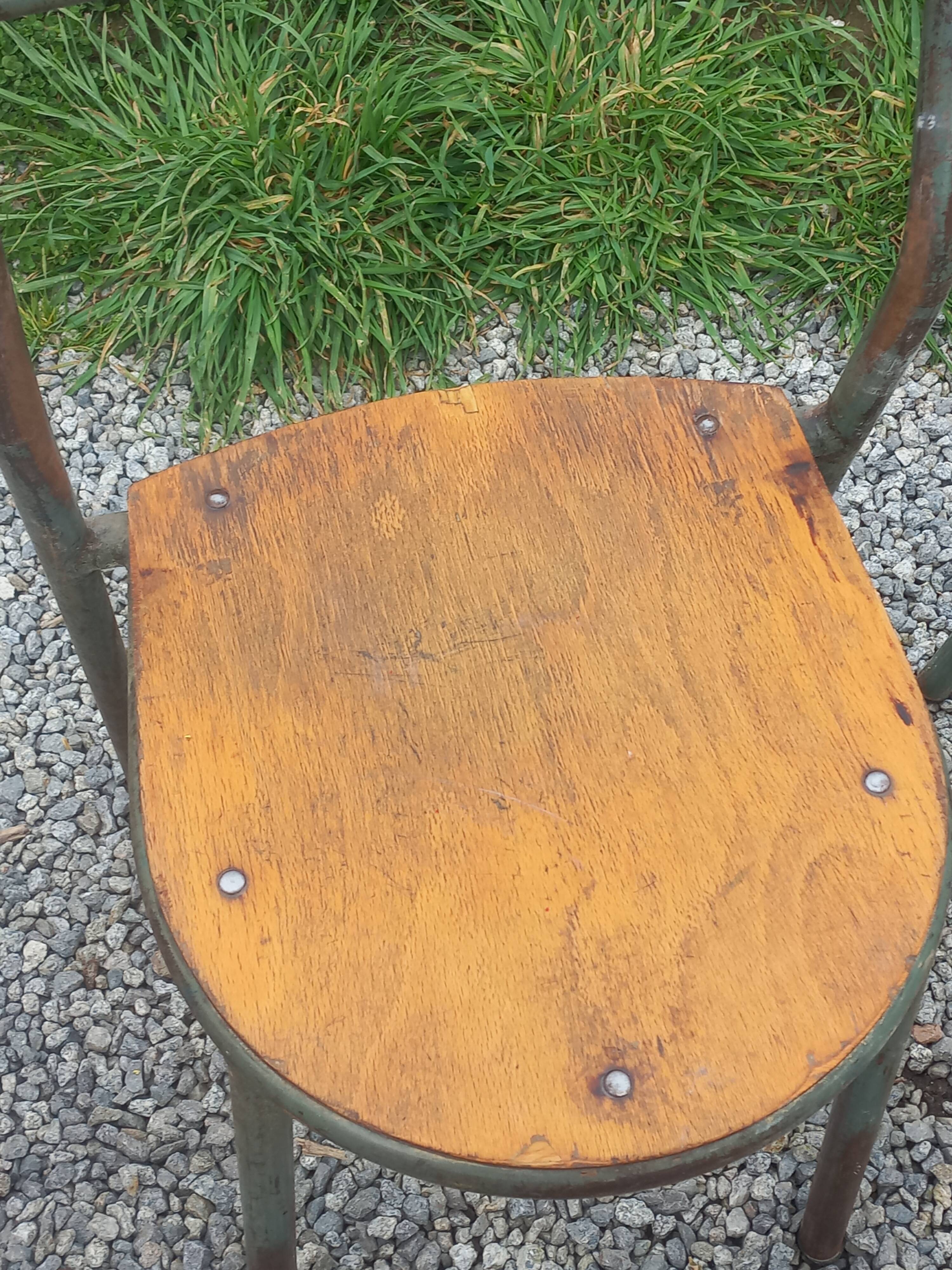 Set de 7 chaises de René Herbst métalliques assises bois