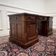 Classic English desk with green leather inlay.