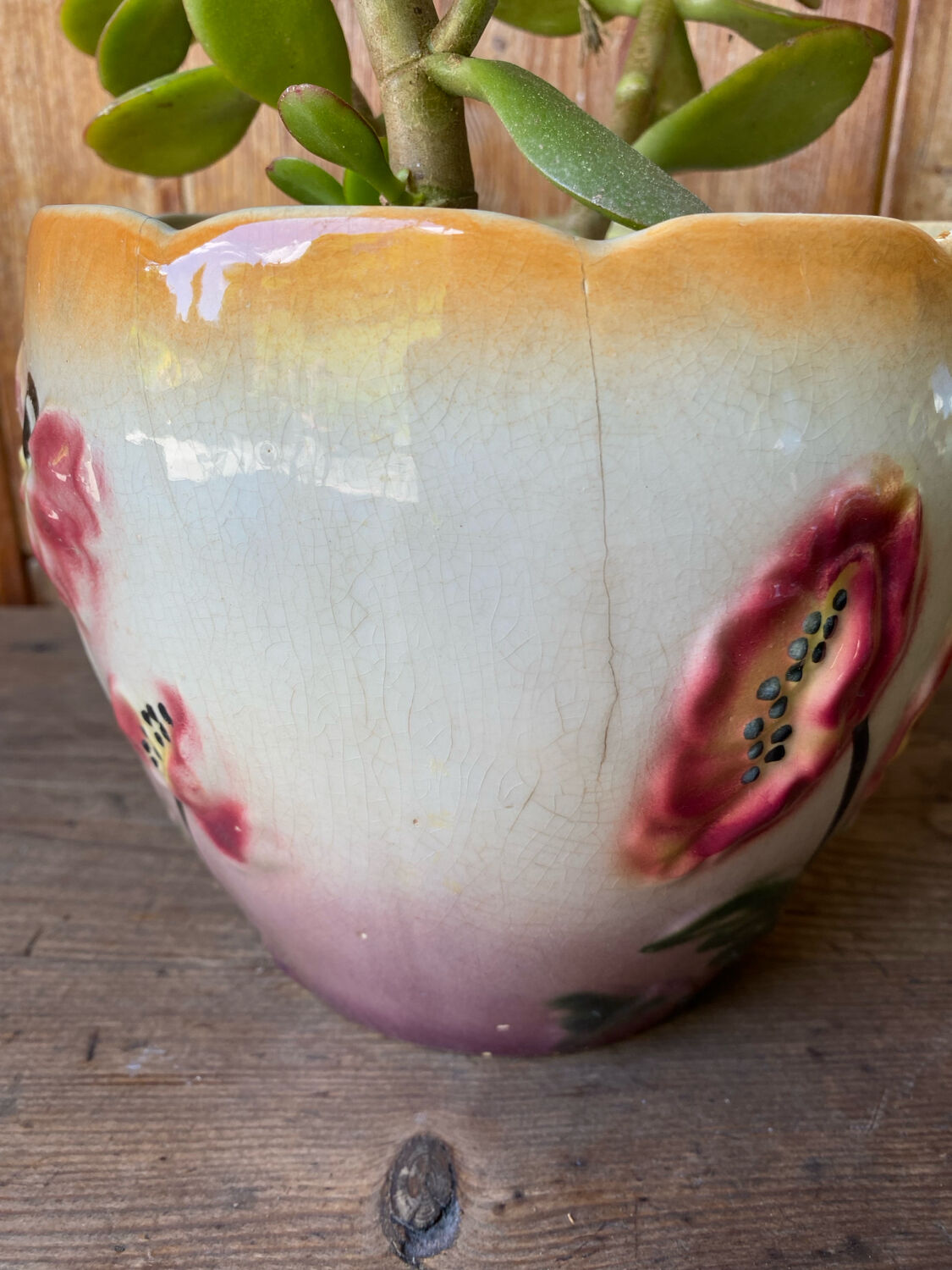 Earthenware cache pot with slip decoration.