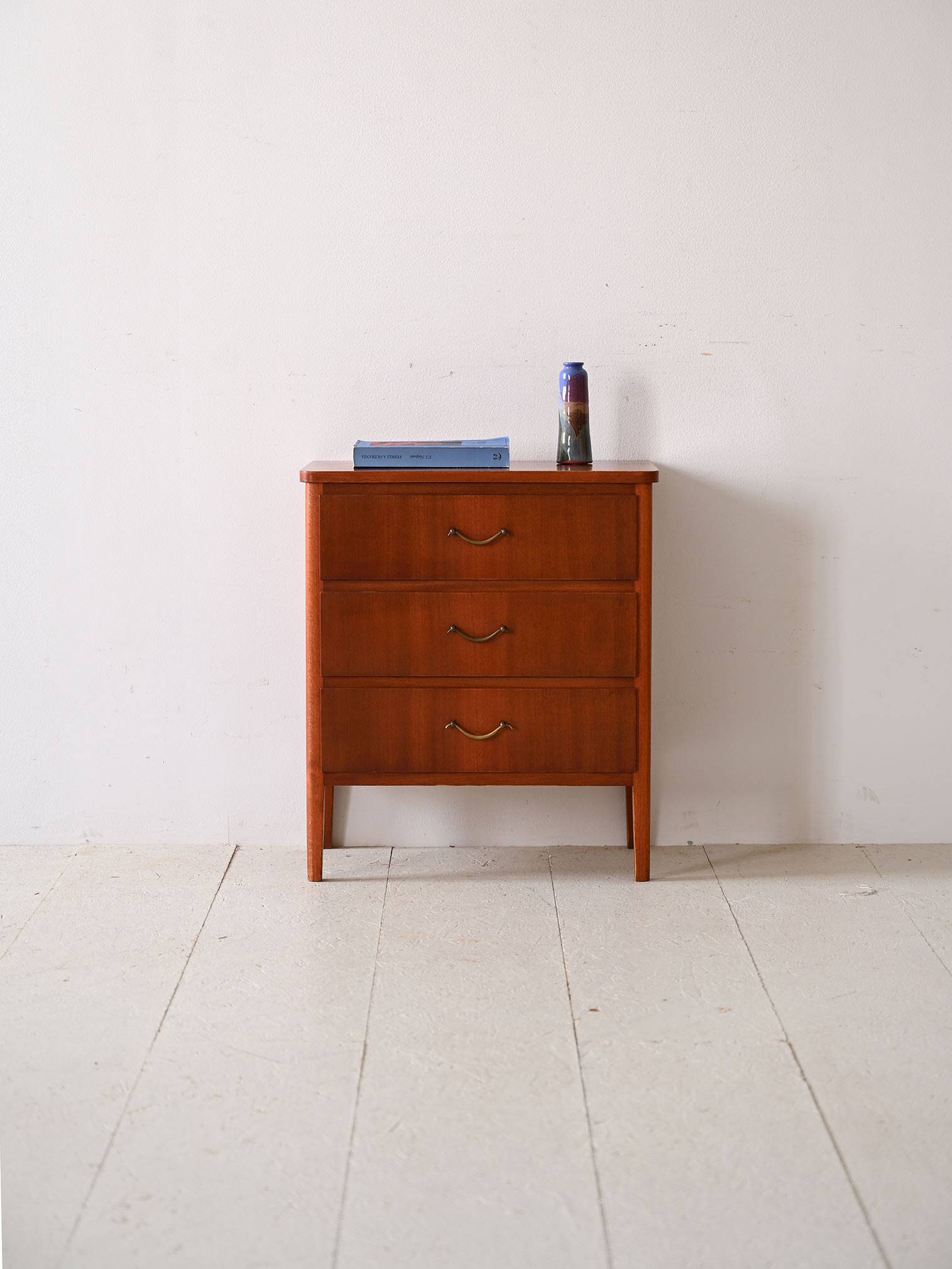 Mahogany chest of drawers with metal handles