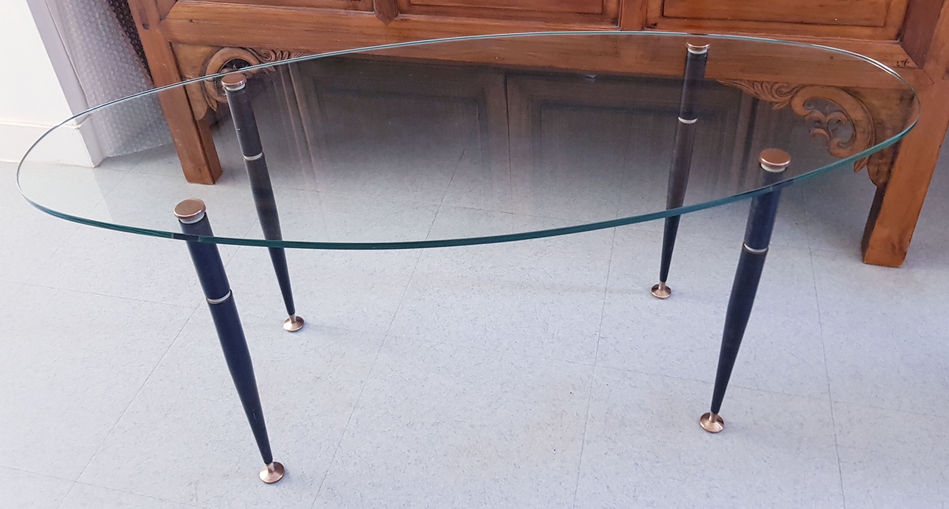 1950 oval coffee table in steel and brass glass