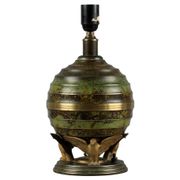 Art Deco table lamp in patinated bronze with eagles holding a globe, France 1940.