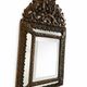 Small mirror with brass parcloses in repoussé style Louis XIV, late 19th century.