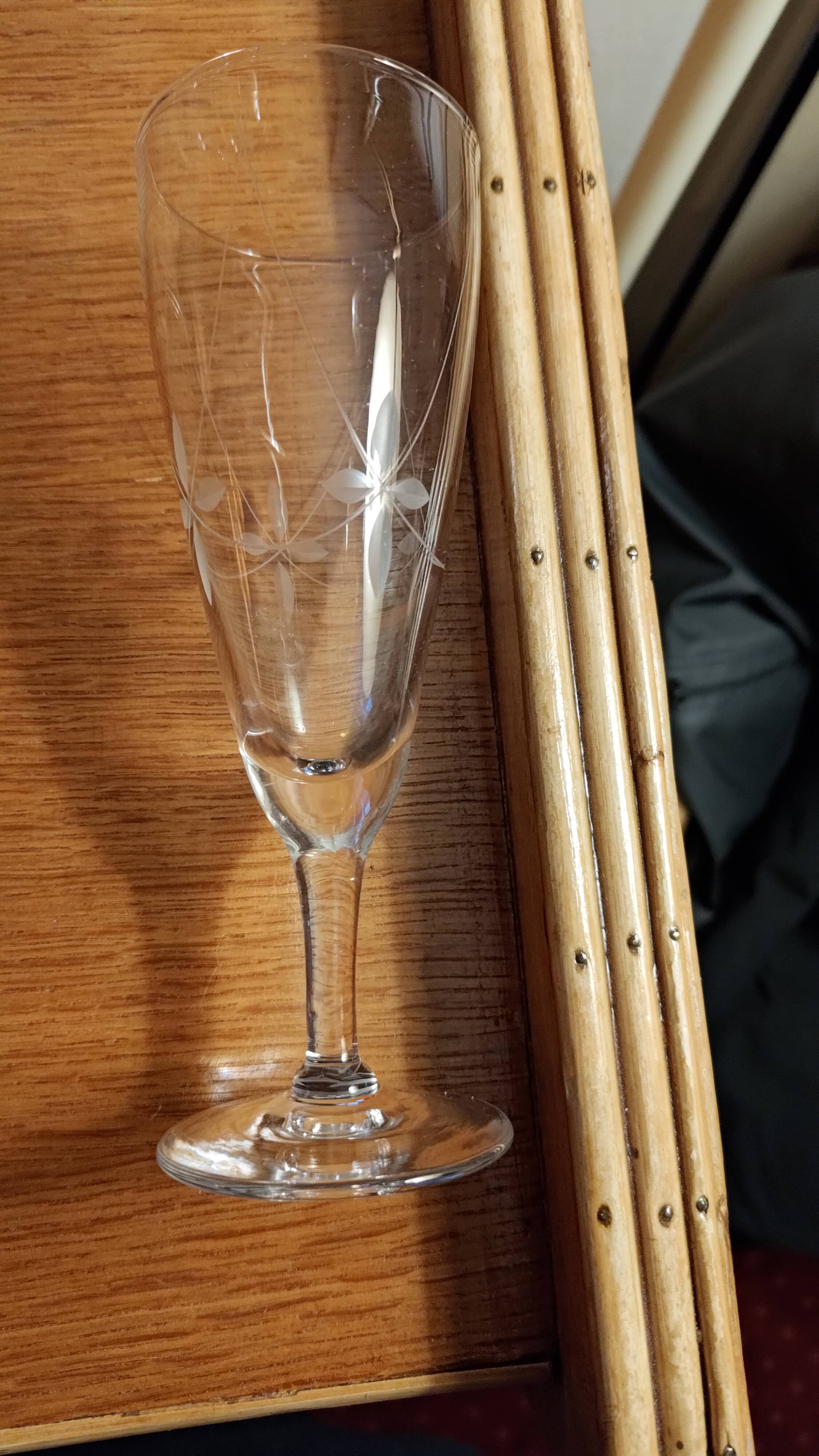Six engraved crystal champagne flutes