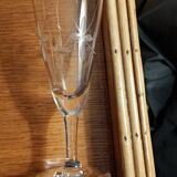 Six engraved crystal champagne flutes