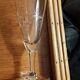 Six engraved crystal champagne flutes