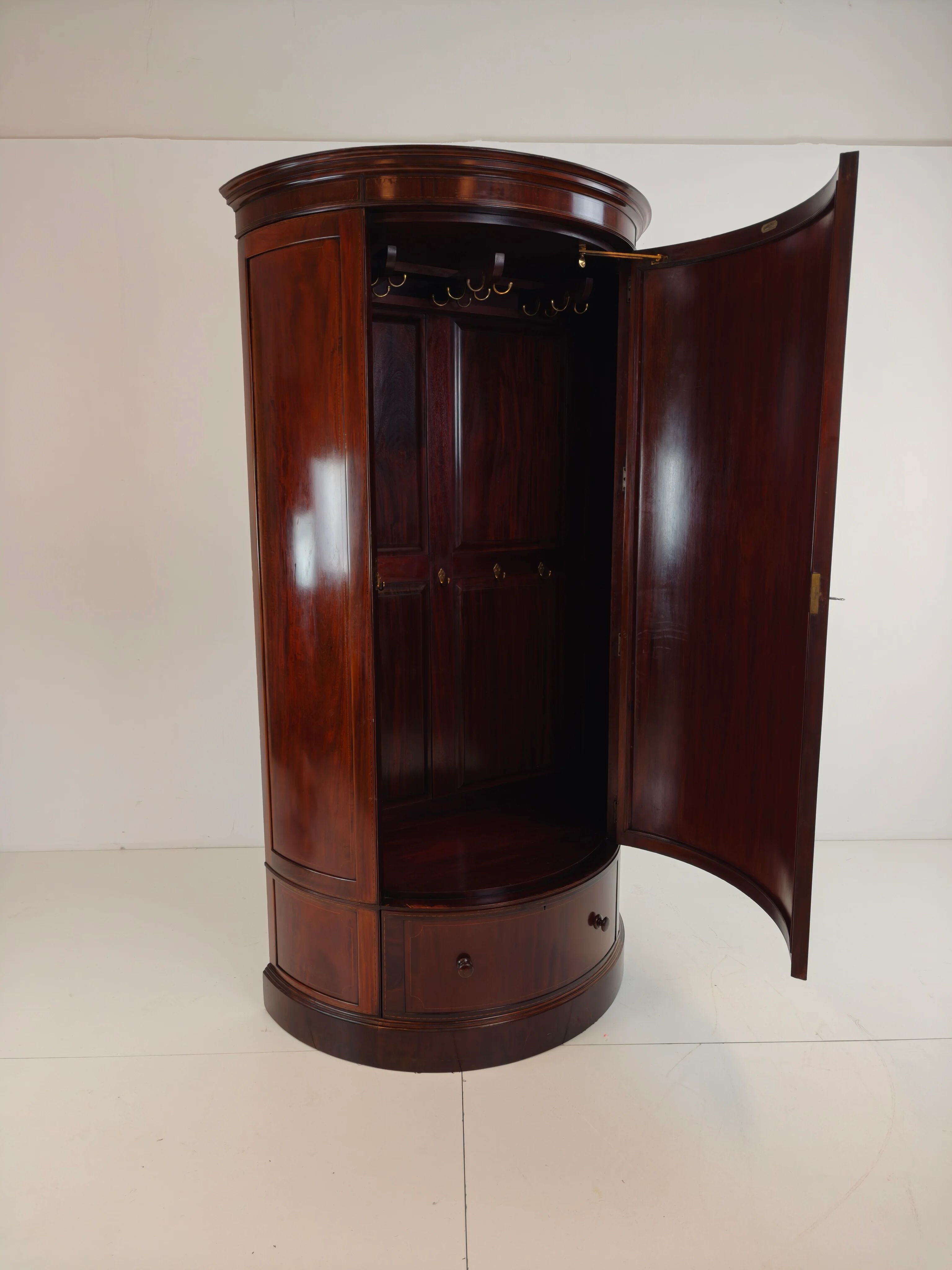 Edwardian mahogany bow-fronted wardrobe by Maple & Co