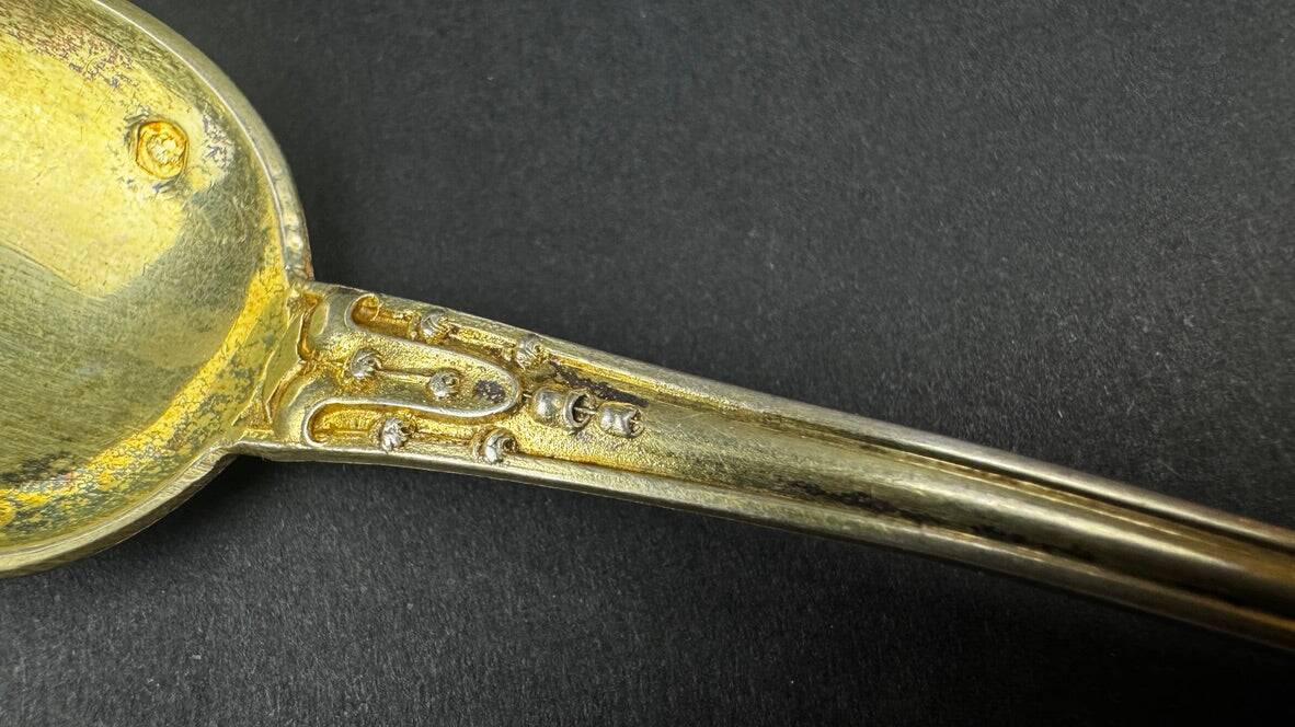 12 dessert spoons in vermeil, Minerva 19th century, blackened pear tree box