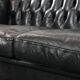 Set consisting of a cowhide leather Chesterfield sofa and matching ottoman