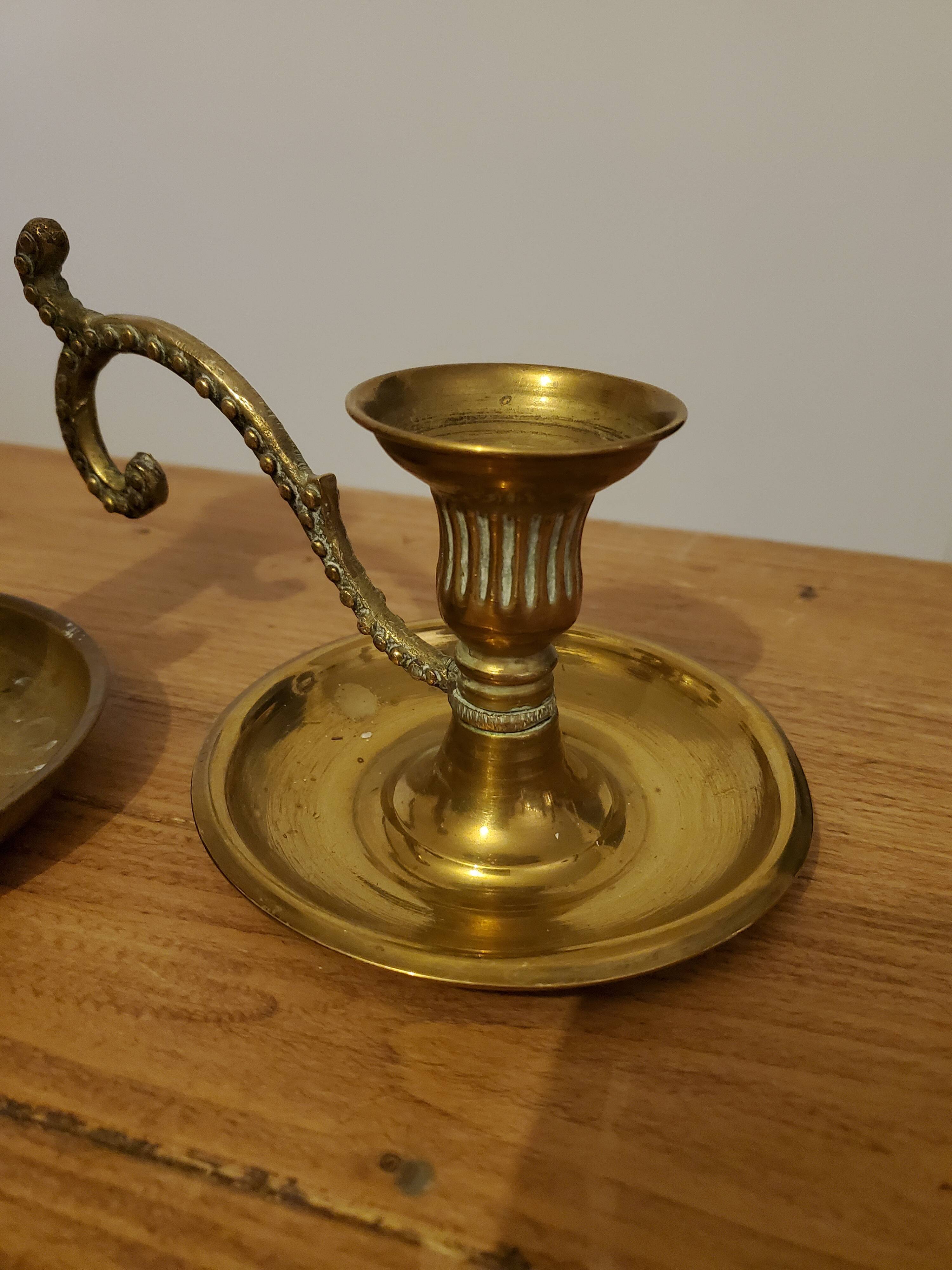 Set of brass candle holders