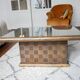 Square table in woven chestnut, with glass top