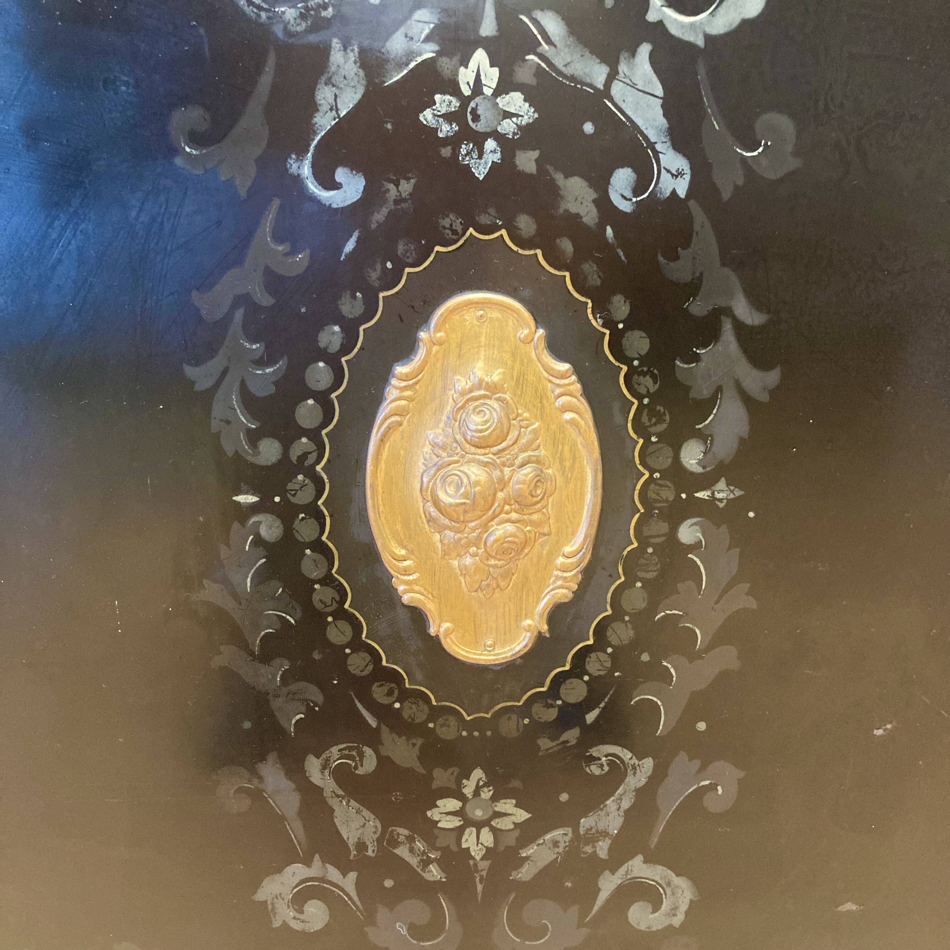 Antique metal fireplace screen.