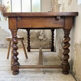Paneled walnut desk with turned legs, 1900