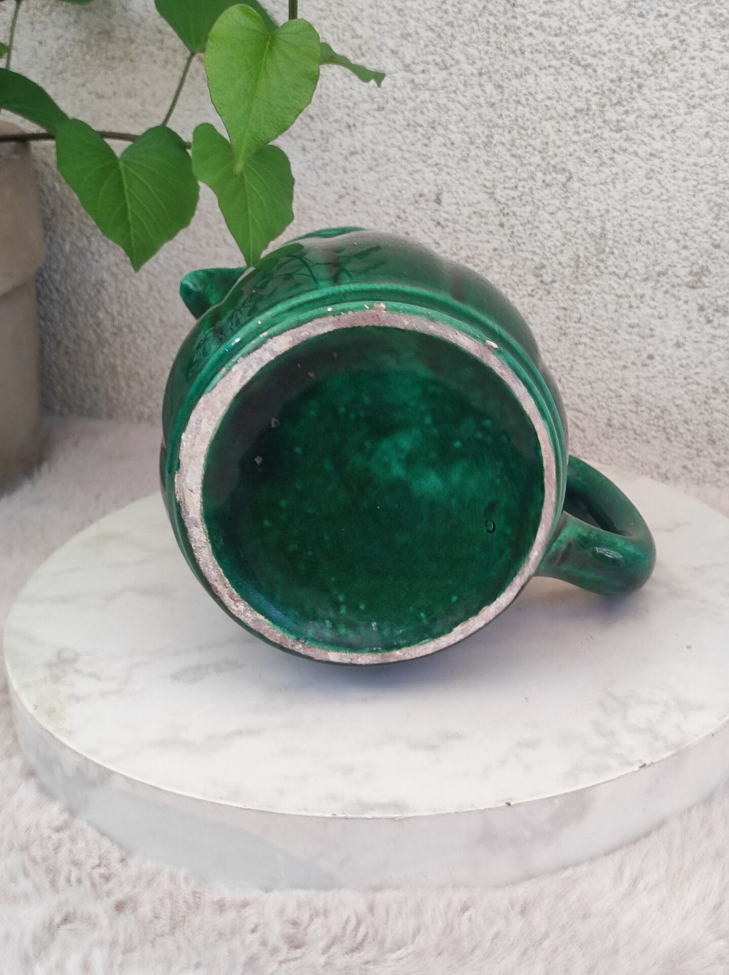 Old green jug