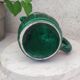 Old green jug