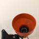Orange pinch lamp