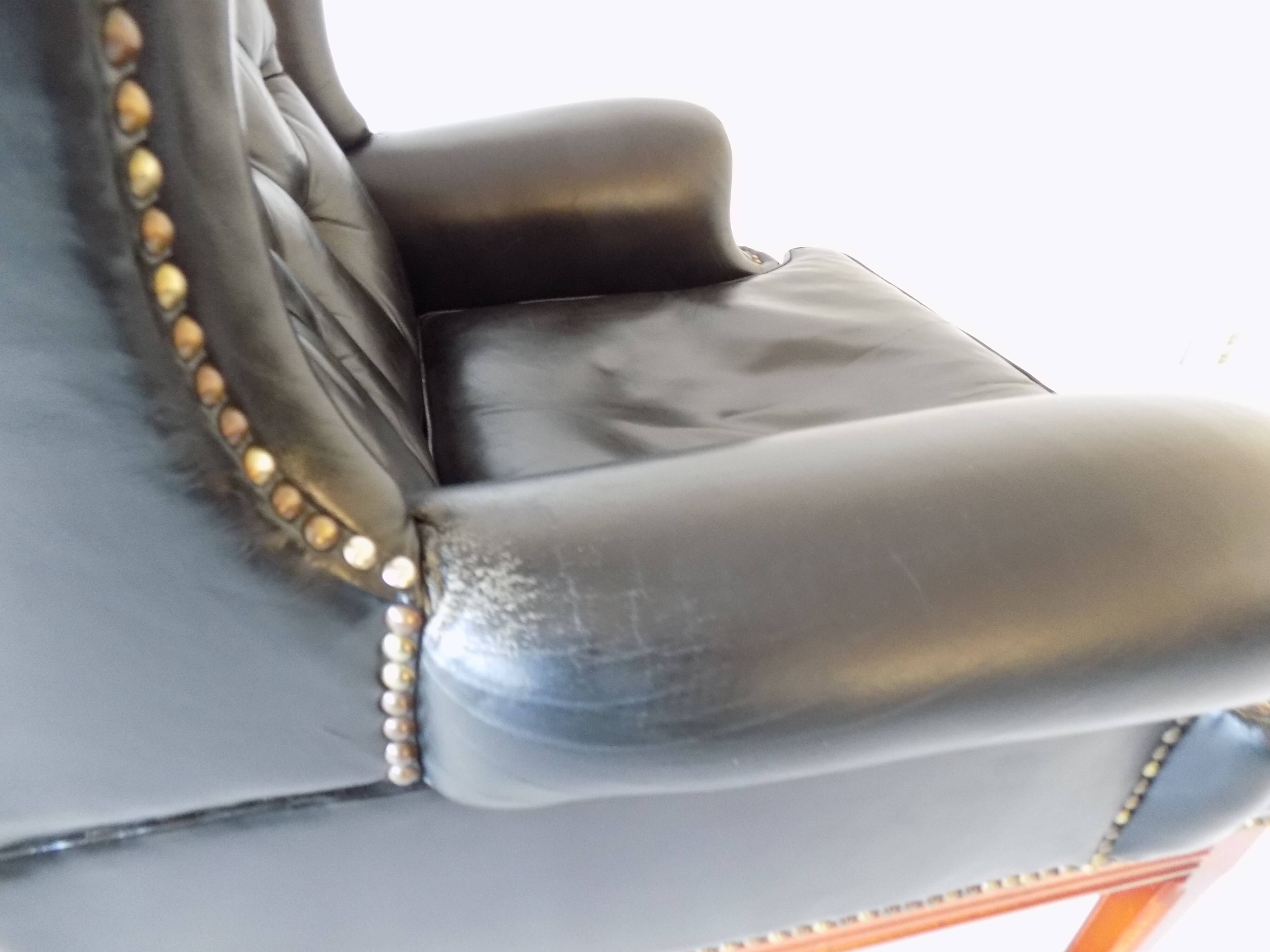 Chesterfield high back leather armchair black from the 1960s