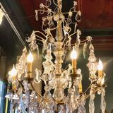 Large chandelier with tassels and old daggers