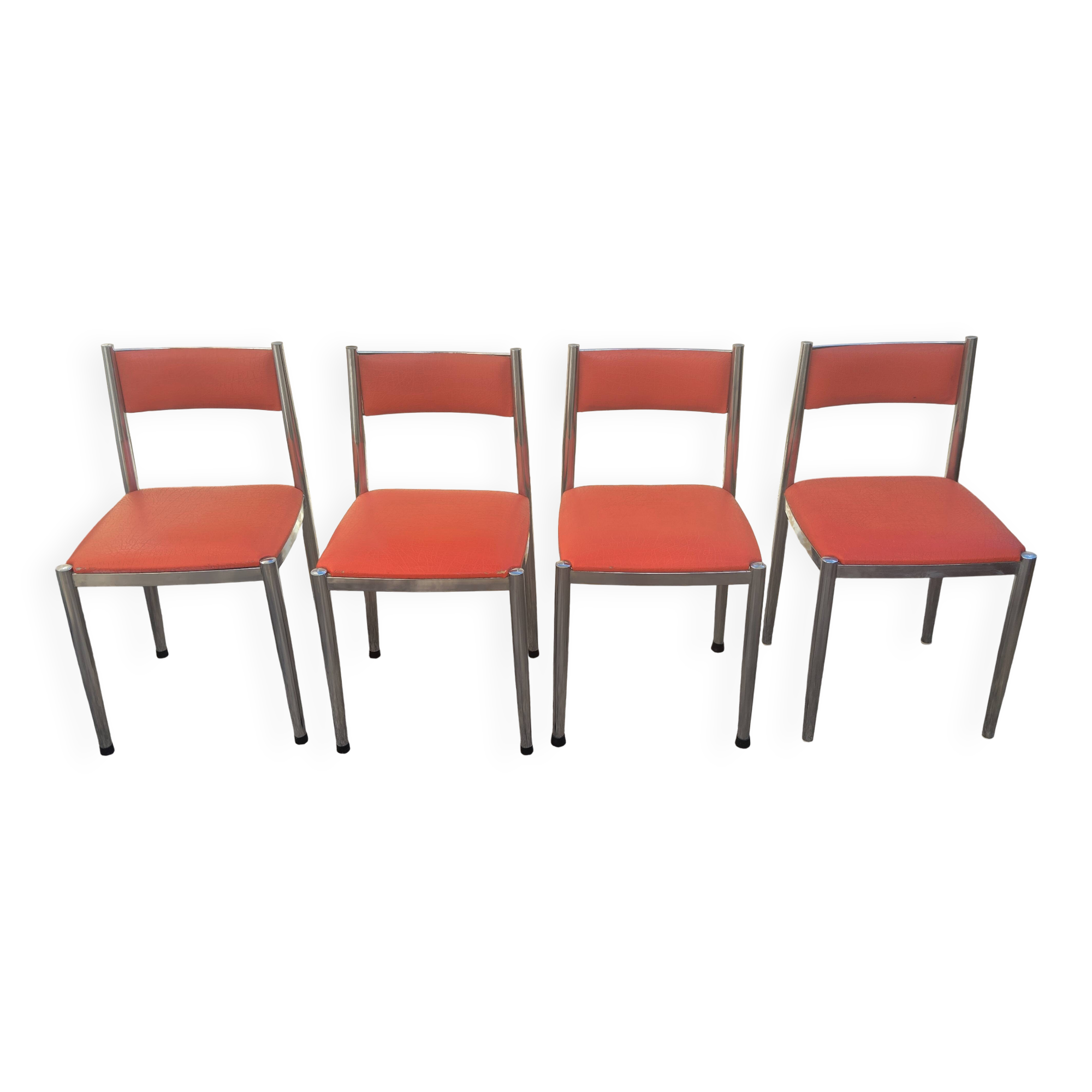 Set of 4 vintage chrome and orange faux leather chairs.