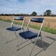 Set of 2 vintage folding chairs by the brand Souvignet.
