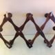 Ten-headed accordion coat holder / vintage 60s-70s