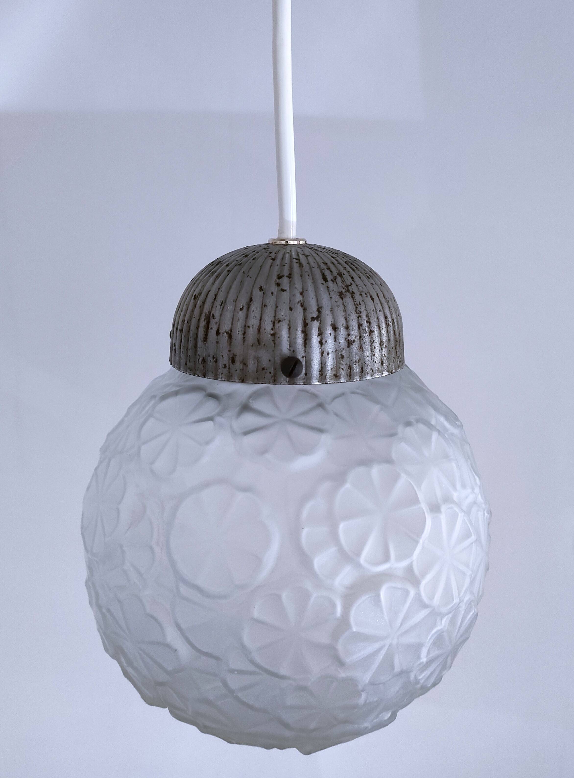 Art Deco glass ball pendant with floral decor