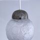 Art Deco glass ball pendant with floral decor