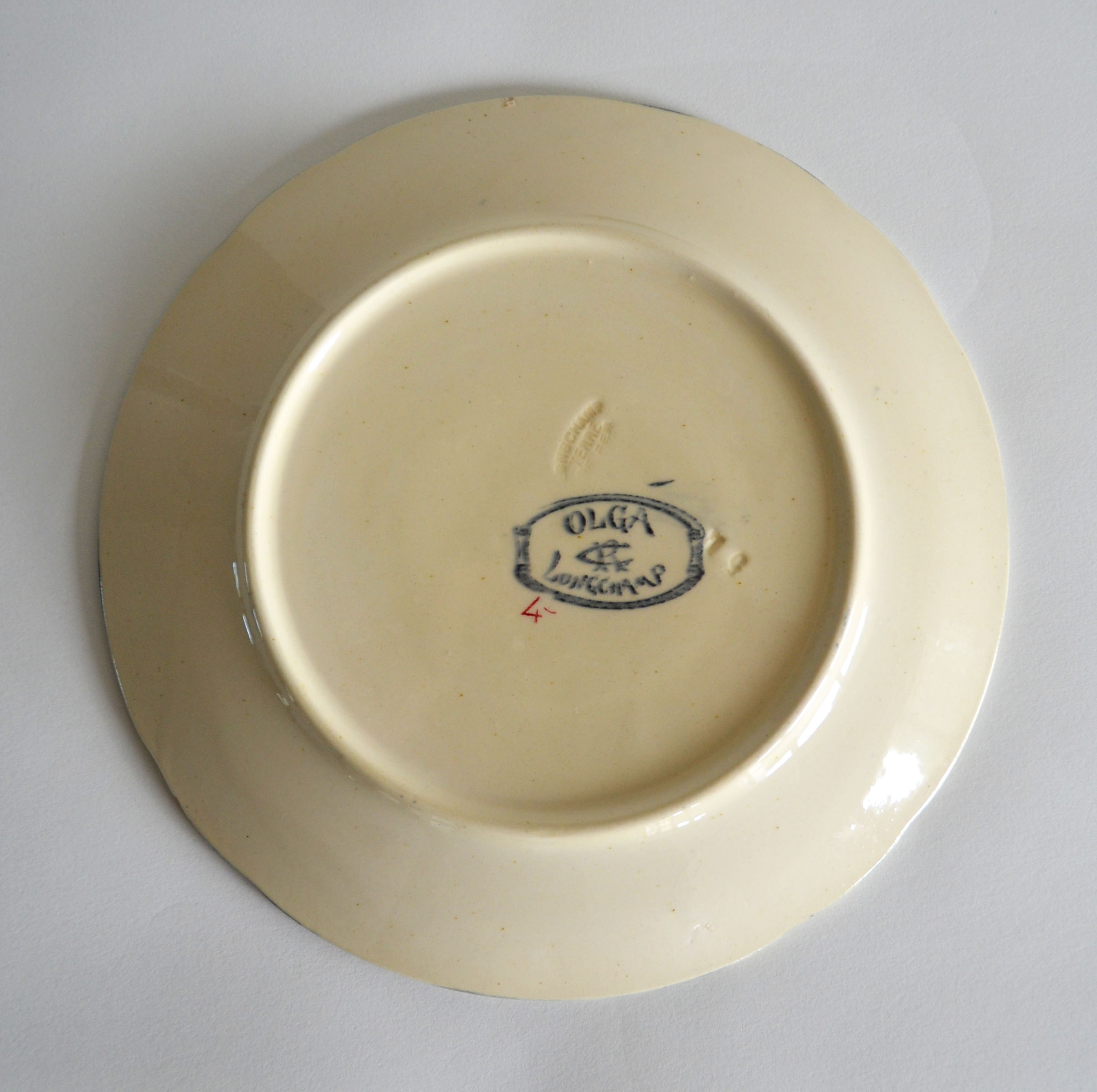 4 mismatched iron earth dessert plates