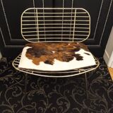 Designer gold thread armchair with cowhide cushion