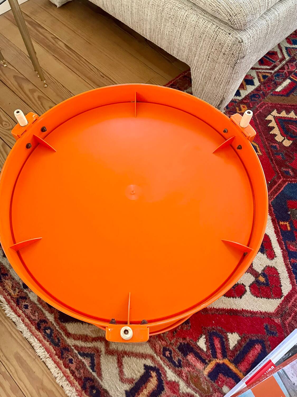 Round orange plastic side table 1970