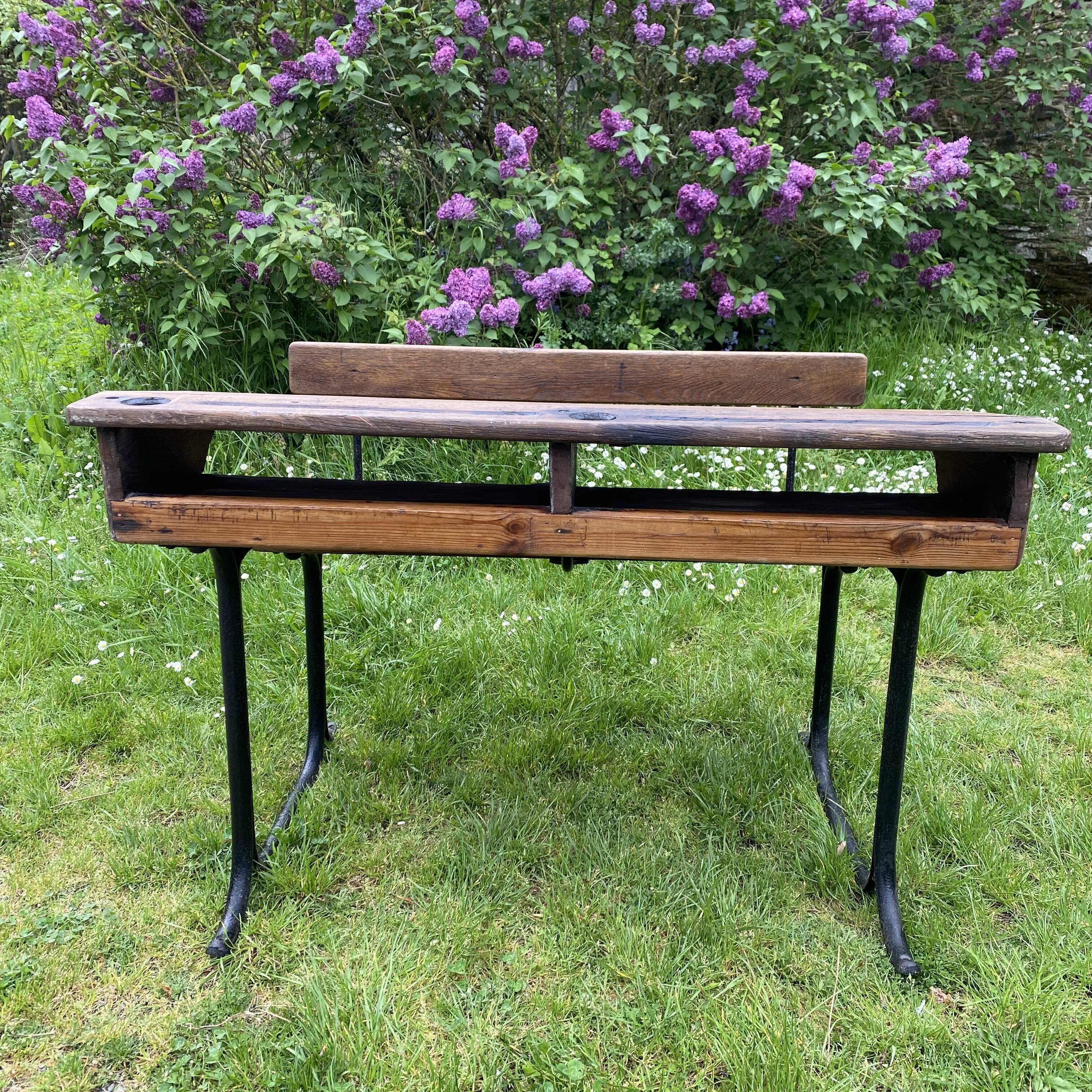 Old school desk in wood and cast iron