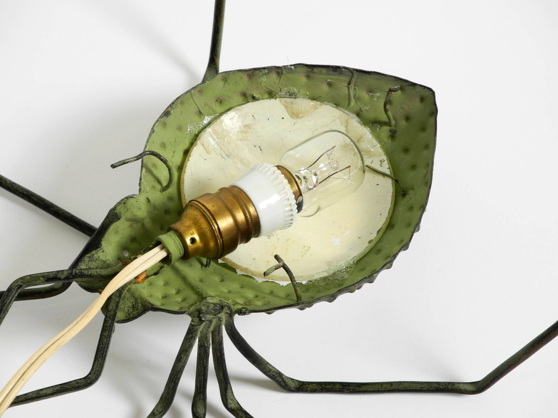 Beautiful Italian Mid Century Modern "Spider" wall lamp made of metal