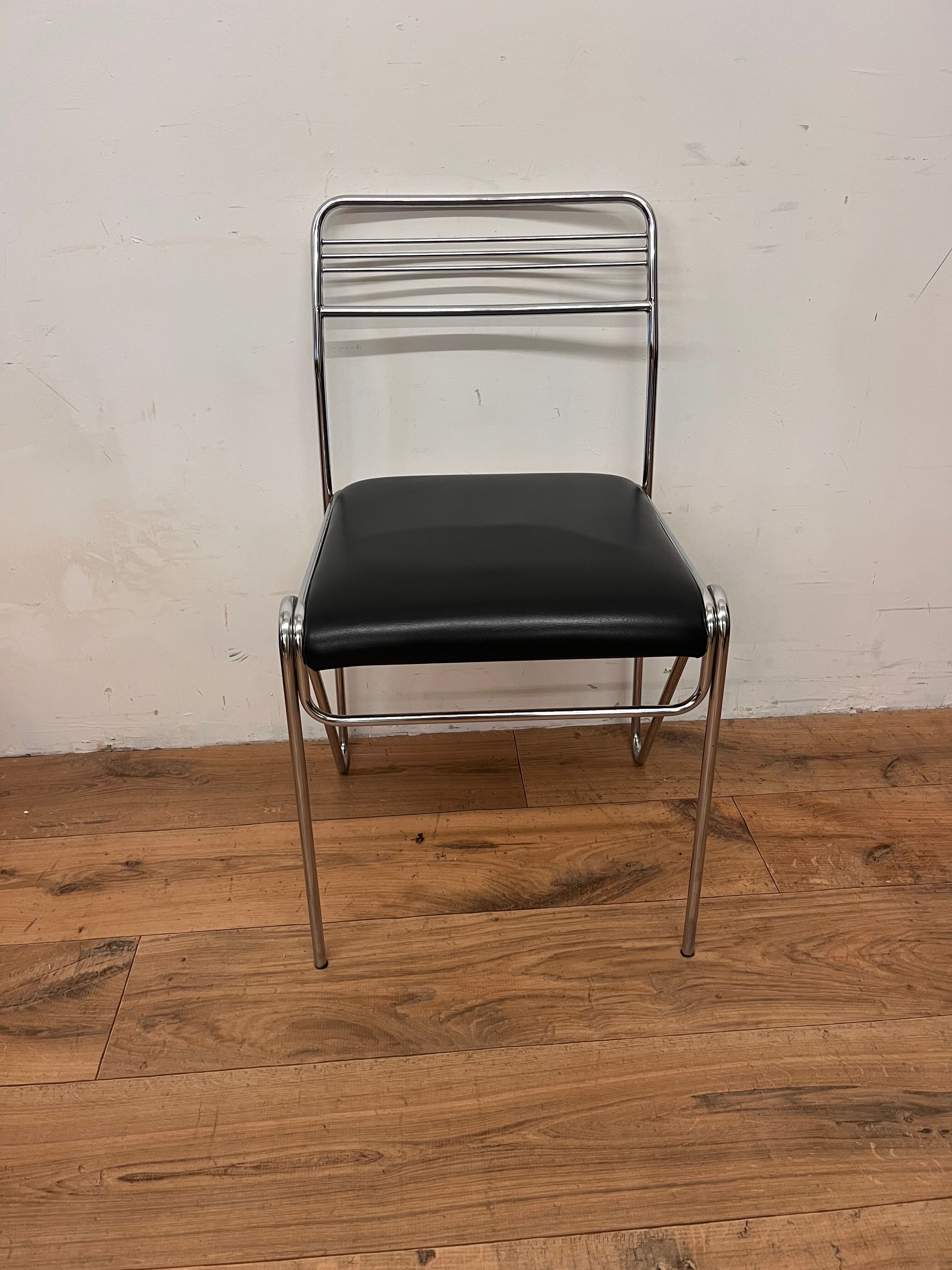 Three chrome and skai chairs from the 70s