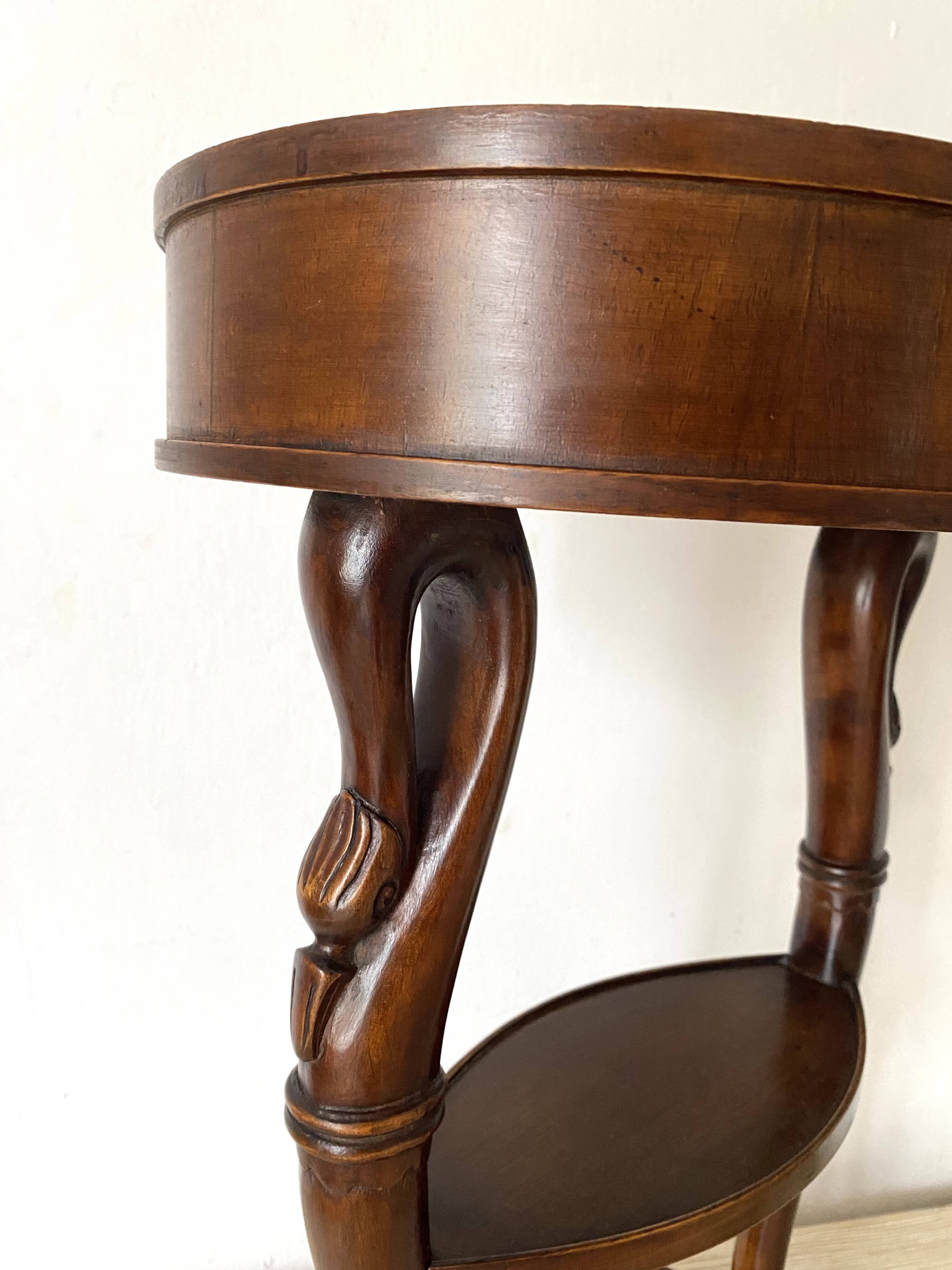 Empire style swan neck and lion paw pedestal table