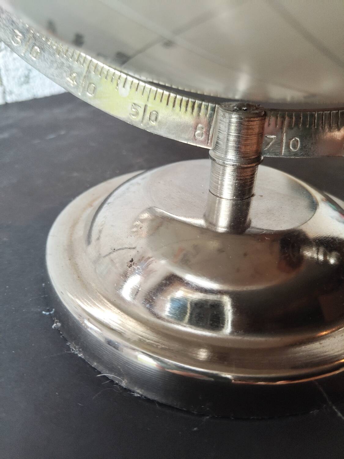 Decorative terrestrial globe on silver metal stand – explorer style