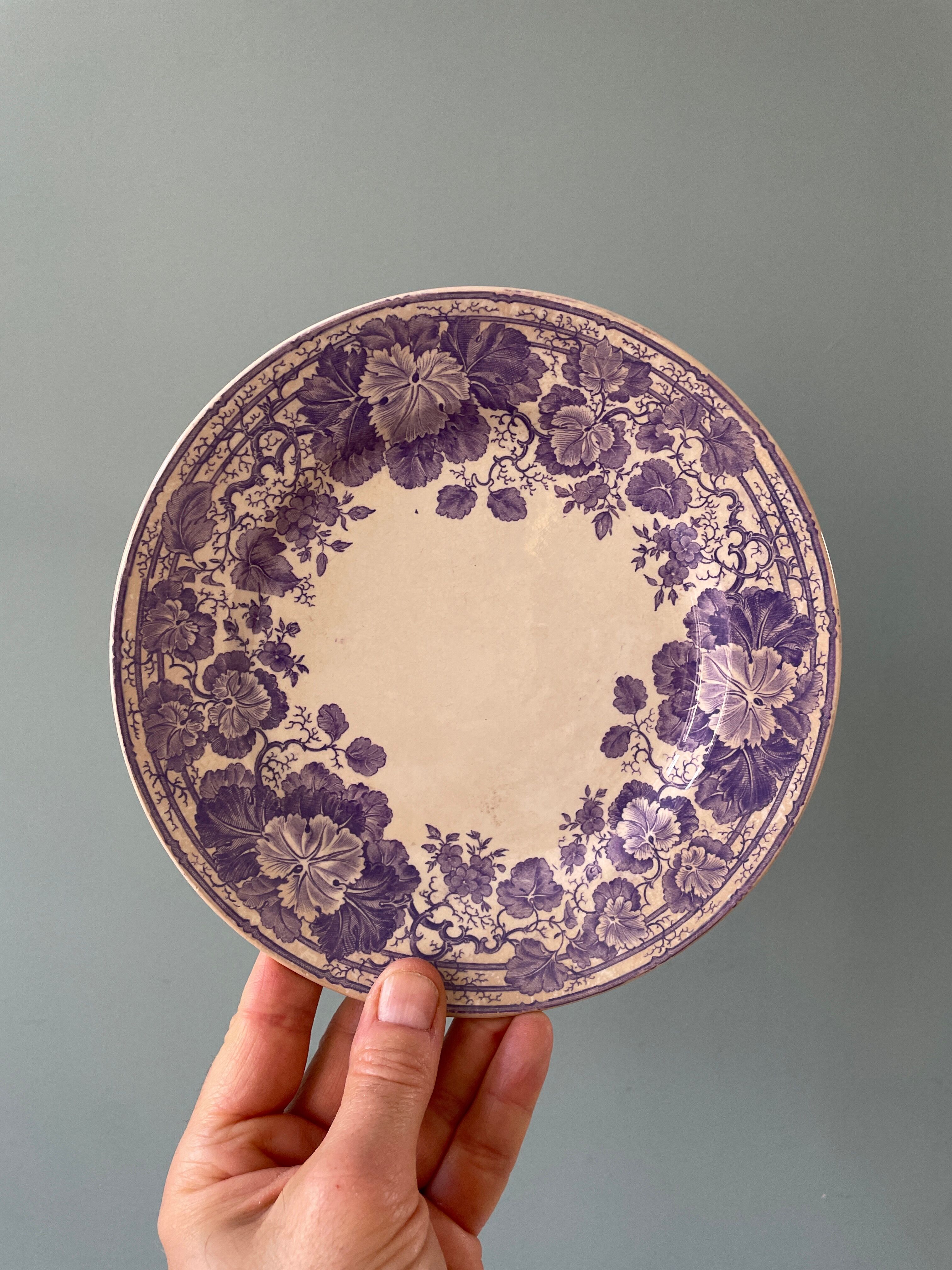 Series of 12 mismatched Terre de Fer dessert plates