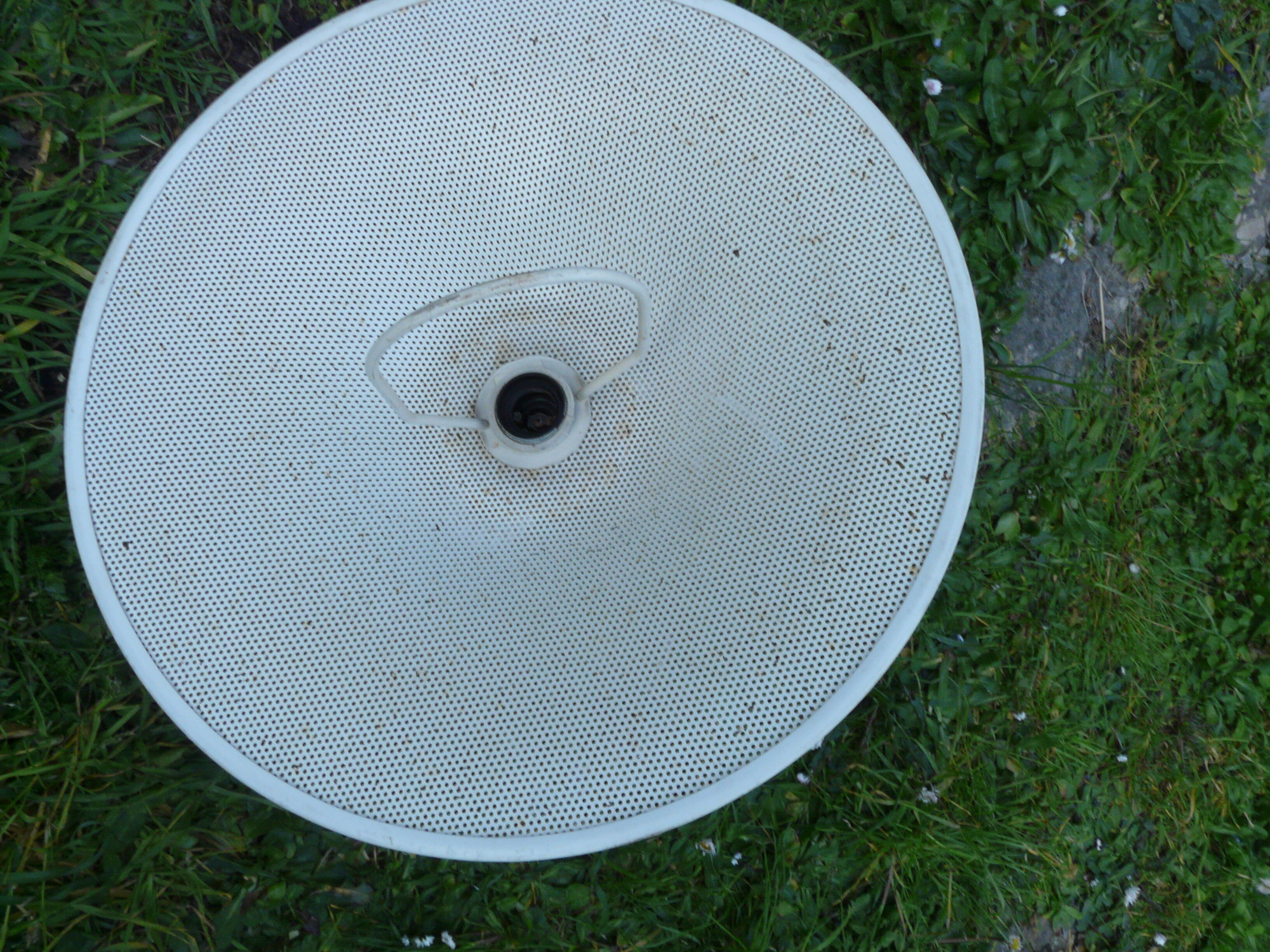 White perforated sheet metal chandelier