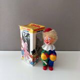 Vintage wind-up clown Carl