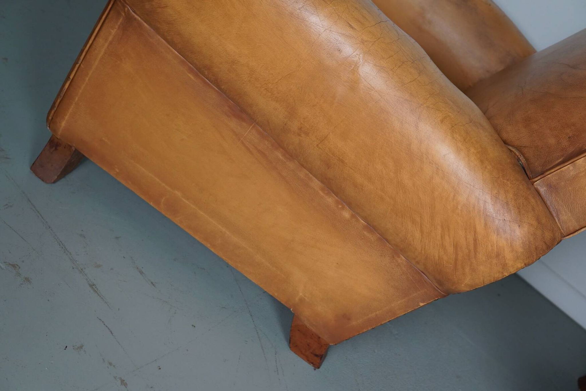 Pair of French Cognac Moustache Back Leather Club Chairs, 1950s