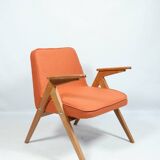 Fauteuil scandinave orange brûlée conclu par Chierowski