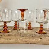 6 small amber stemmed glasses