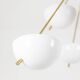 Stilnovo. Chandelier in gilded brass and white lacquered metal. Contemporary.