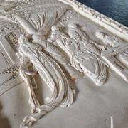 Sculpted resin plaque in the style of China.