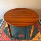 Table ronde vintage avec rallonge intégrée
