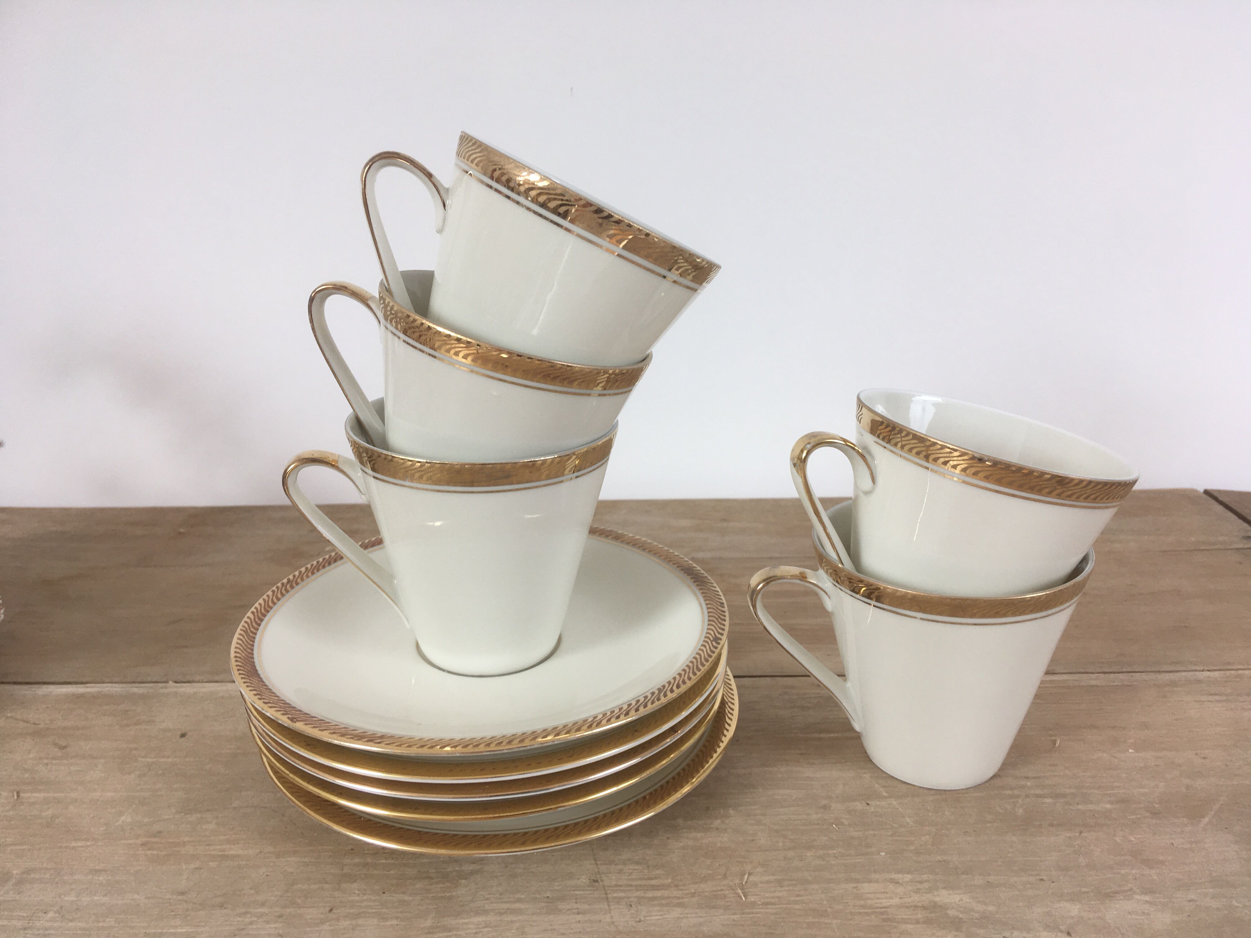 White & gold porcelain coffee cups