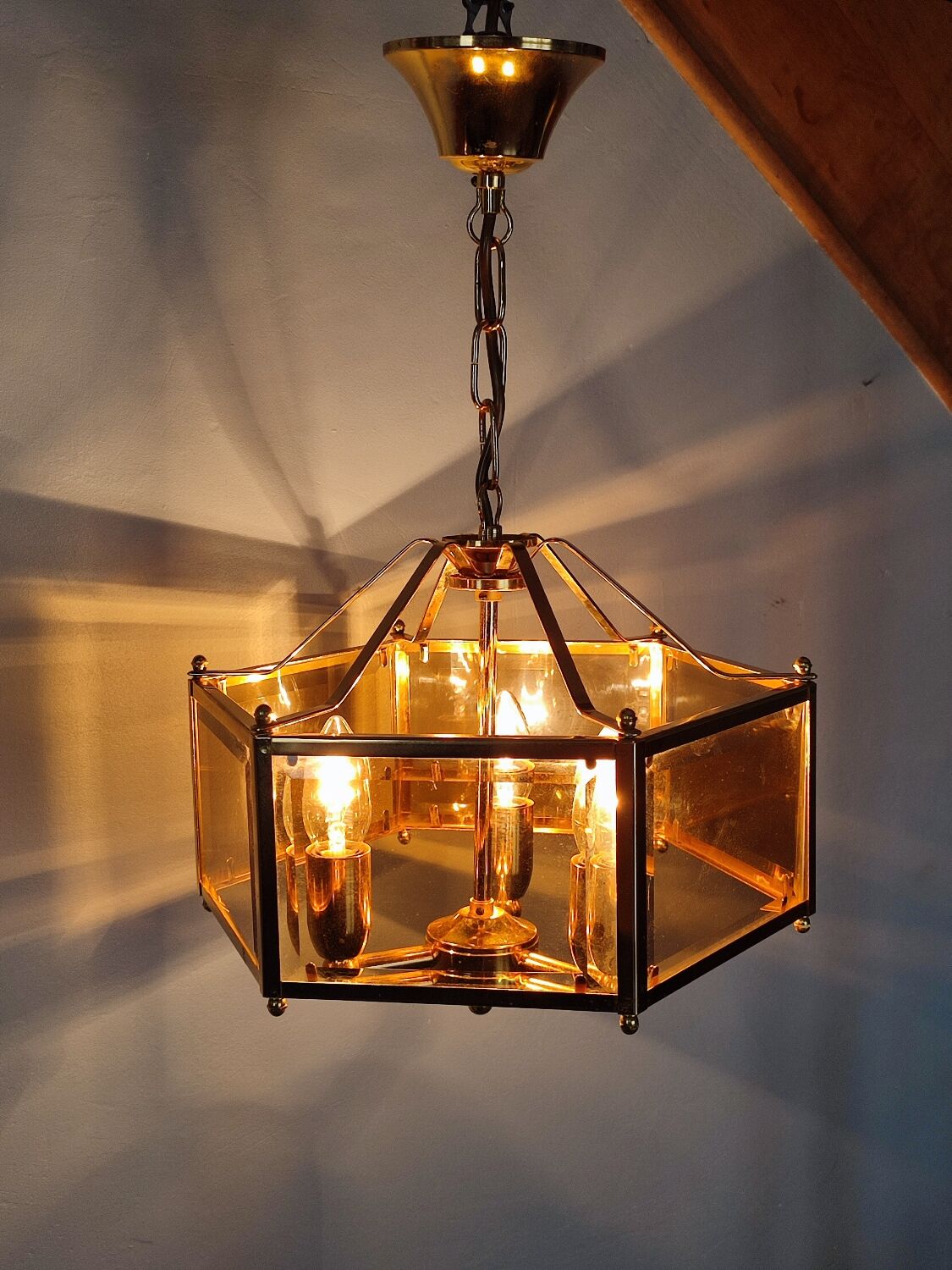 Brass pendant lamp and five-faceted vintage smoked glasses